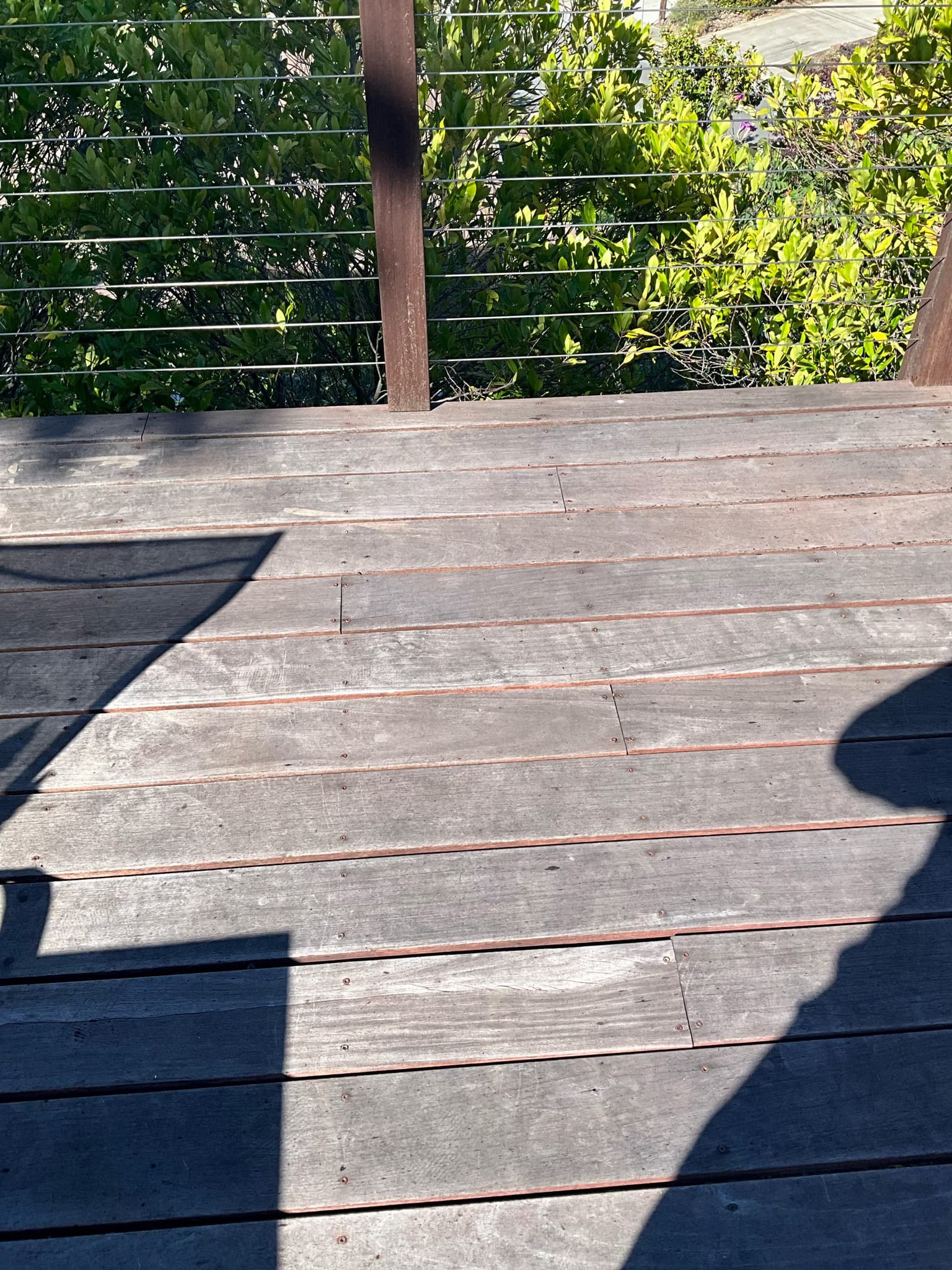 restore a 7-year gray ipe deck to its original dark brown