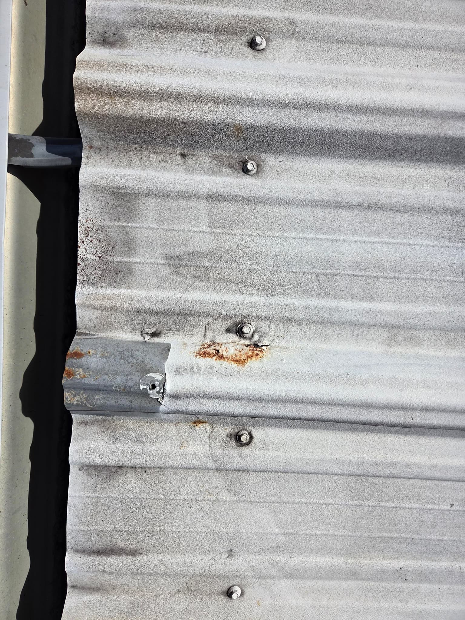 replace the whole metal roof