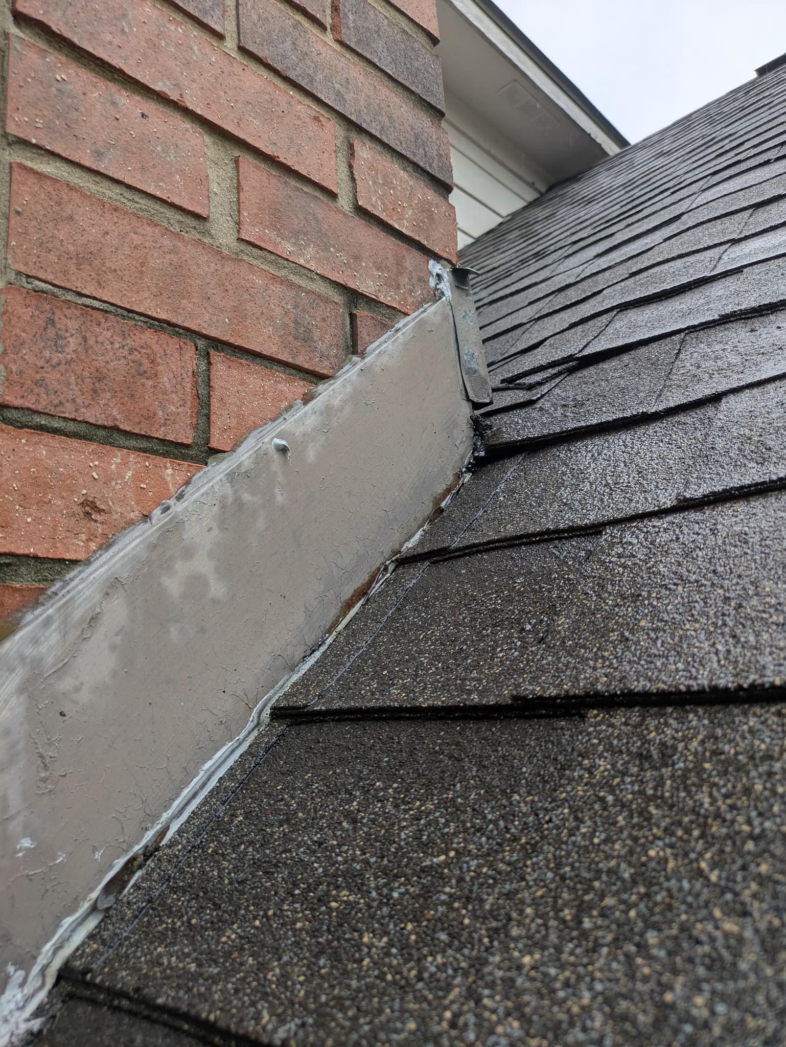 repair the leaking roof section above the garage