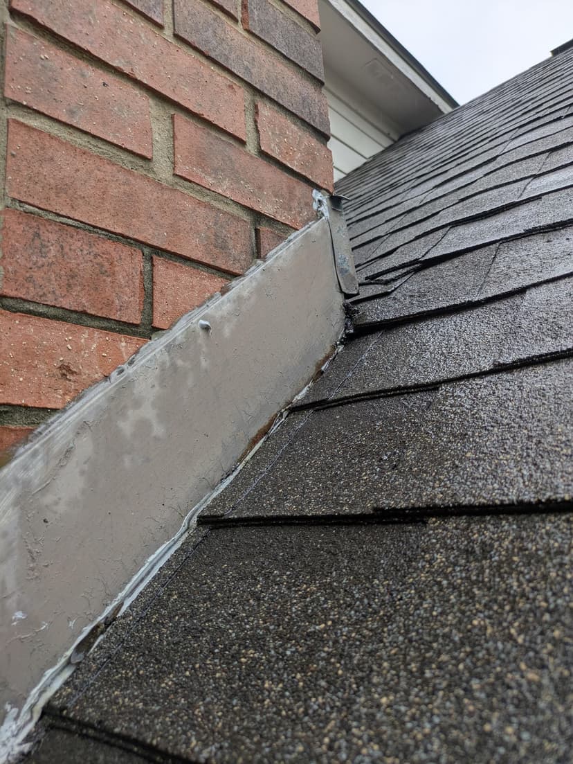 repair the leaking roof section above the garage