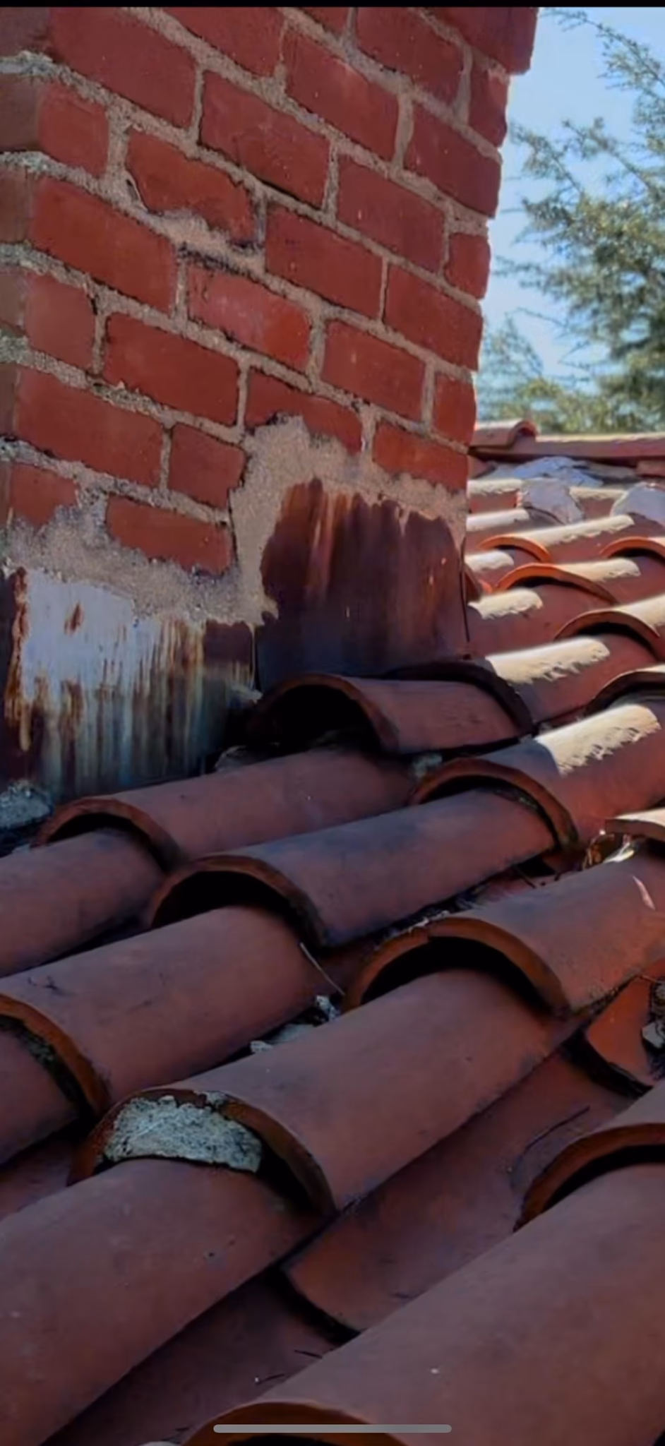 lift and relay 600 sq ft of tile around the chimney