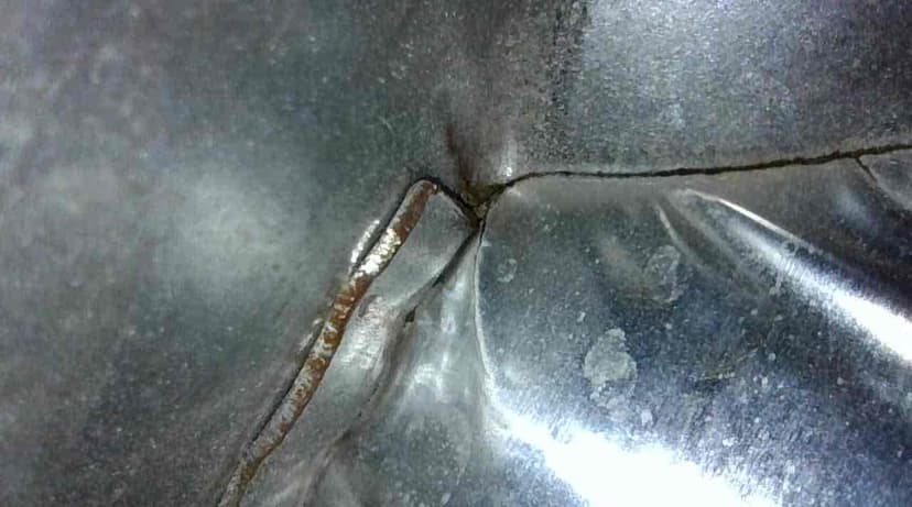 replace a cracked heat exchanger